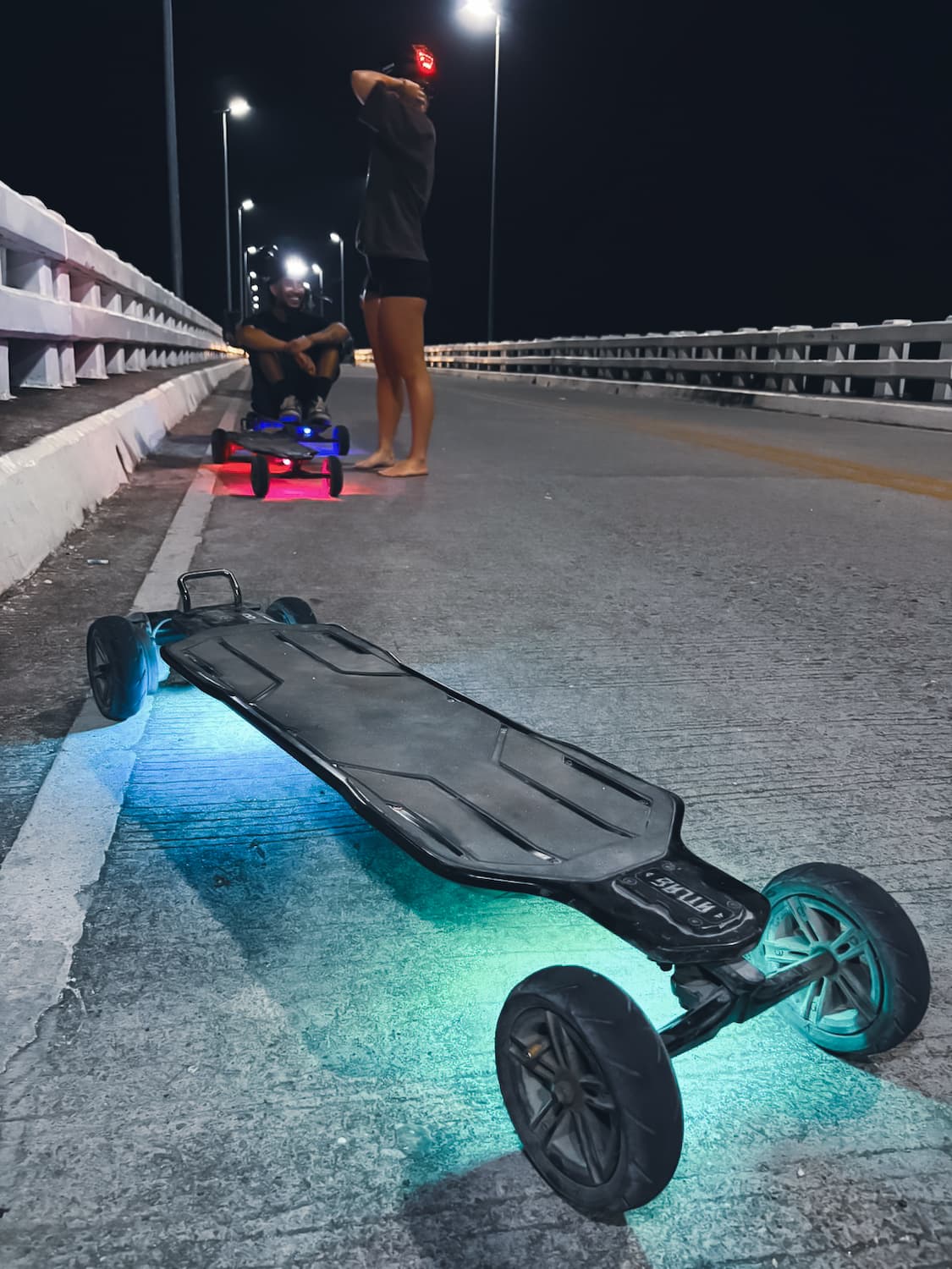 Electric skateboard glowing blue on the Siargao night tour